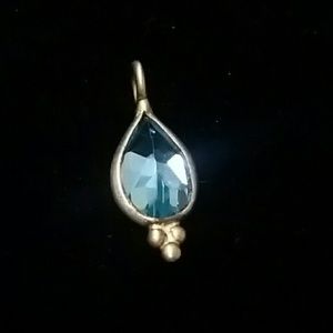 Tiny gold-plated sterling silver charm